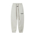 Fog Essentials Black‑Logo Light Oat Heather‑Grey Relaxed‑Fit Tapered Sweatpants